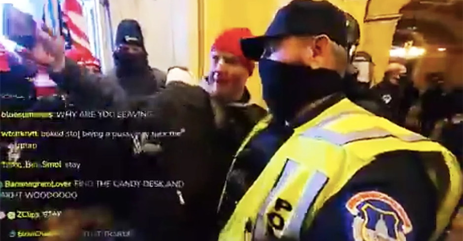 Capitol Police Member Caught on Camera Taking Selfies With Trump's Insurrectionists