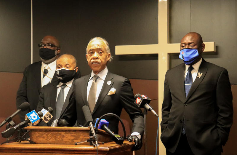 Rev. Sharpton addressing reporters flanked by (l-r) Bishop Timothy Clarke of the First Church of God, Attorney Michael Wright and Attorney Ben Crump.