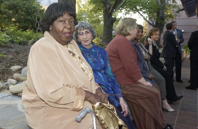 Minnie Jones, left, and Leah Karpen at the annual banquet for Minority Enterprise Development Week at the Renaissance Hotel in 2004