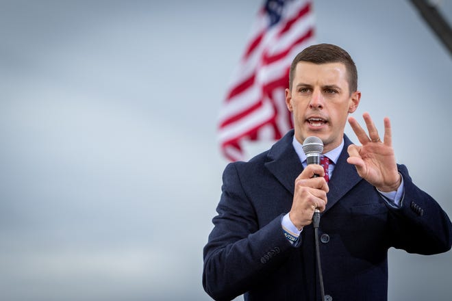 Michigan House spokesman Lee Chatfield speaks to the crowd before President Donald Trump speaks at a rally at Muskegon County Airport in Muskegon on October 17, 2020.
