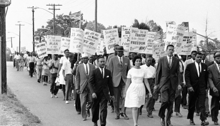 Members of the NAACP march to emphasize their integration demands in Jacksonville, Florida, April 22, 1964.