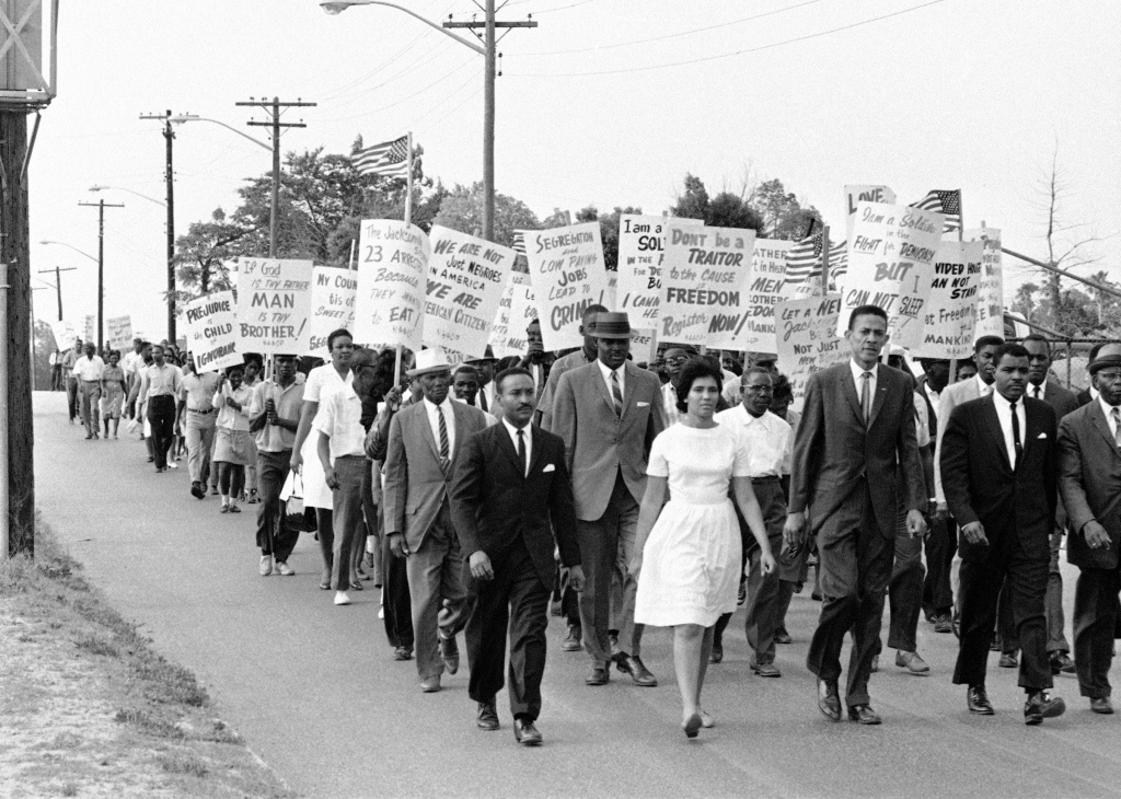 Members of the NAACP march to emphasize their integration demands in Jacksonville, Florida, April 22, 1964.