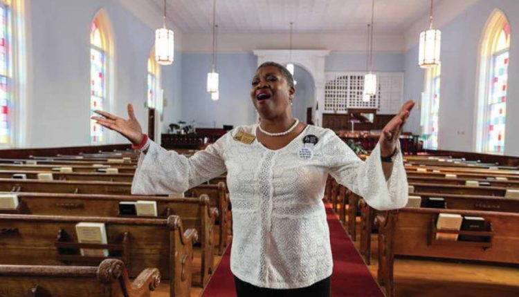 Wanda Howard Battle, tour guide at the church where Dr.  Martin Luther King Jr. once preached, sang while giving tours and teaching about the king's legacy.  Photo: Provided