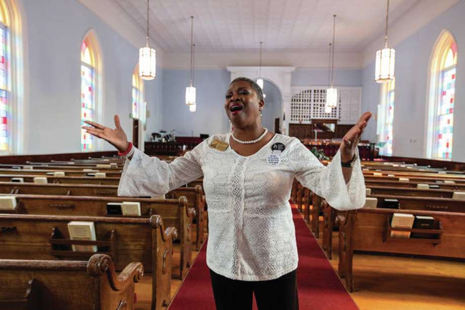 Wanda Howard Battle, tour guide at the church where Dr.  Martin Luther King Jr. once preached, sang while giving tours and teaching about the king's legacy.  Photo: Provided