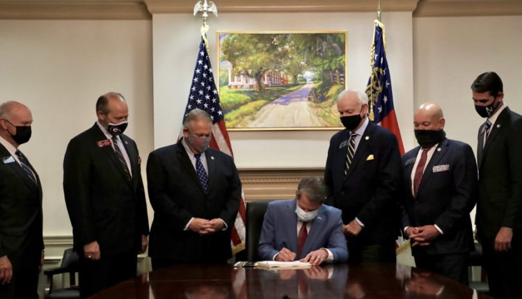 Kemp Chose a 'Monument to Georgia’s History of Brutal White Supremacy' as a Backdrop When Signing His Voter Suppression Law: Columnist