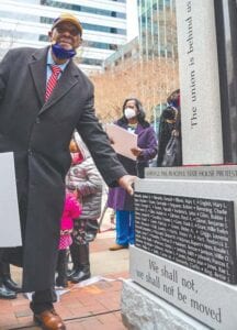 The Rev. James Edwards Jr., the lead plaintiff in the landmark Supreme Court case, refers to his name engraved on the memorial.