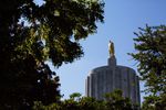 The sun is shining from the Pioneer on the Oregon Capitol in Salem, Oregon on Saturday, June 29, 2019.  Republican Senators returned to the Capitol after a nine-day strike to close the Senate deal before June 30th.