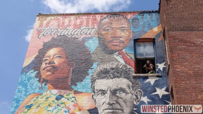 The recently completed mural depicts Martin Luther King Jr., John Brown, and the poet Amanda Gorman.  A solemn ceremony for the mural was held on June 10th, Saturday June 19th.