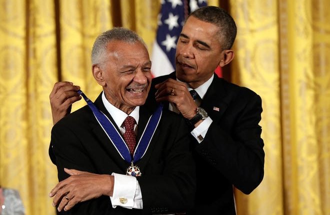 US President Barack Obama gives CT Vivian the Presidential Medal of Freedom in the East Room of the White House on November 20, 2013 in Washington, DC.  The Presidential Medal of Freedom is the nation's highest civilian honor bestowed on those who have done service for the security or national interests of the United States, world peace, or cultural, or other significant public or private endeavors. 