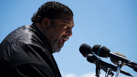 Bishop William J. Barber II speaks at the Morale March on Manchin and McConnell, a campaign rally for the poor people, calling for the filibuster to be abolished and passed