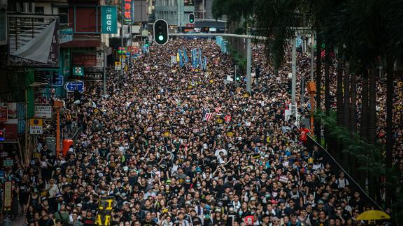 Protesters march during the Civil Human Rights Front march in Wan Chai, Hong Kong, on Sunday, July 21, 2019.